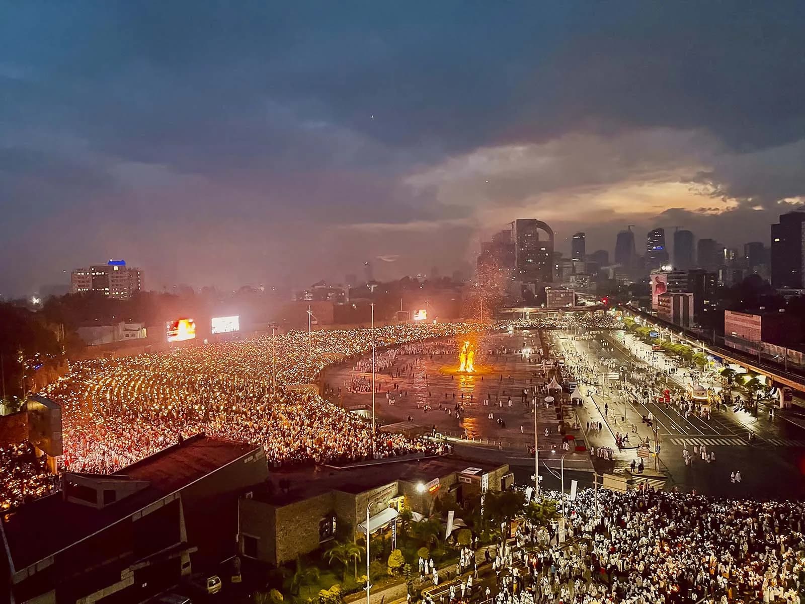 Evening view over a large gathering in the city